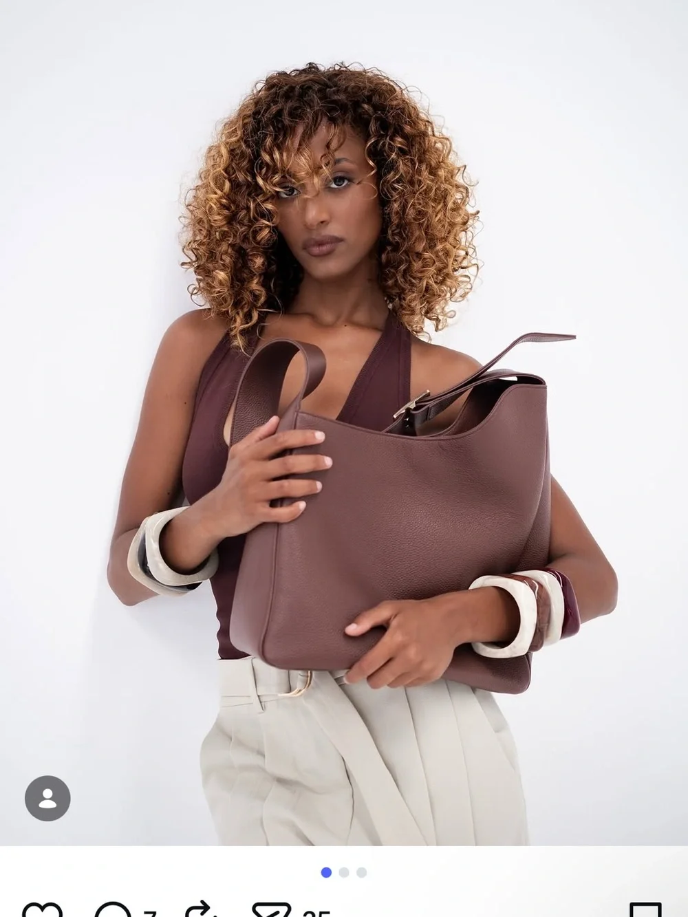 All on seven pebbled leather chocolate bag